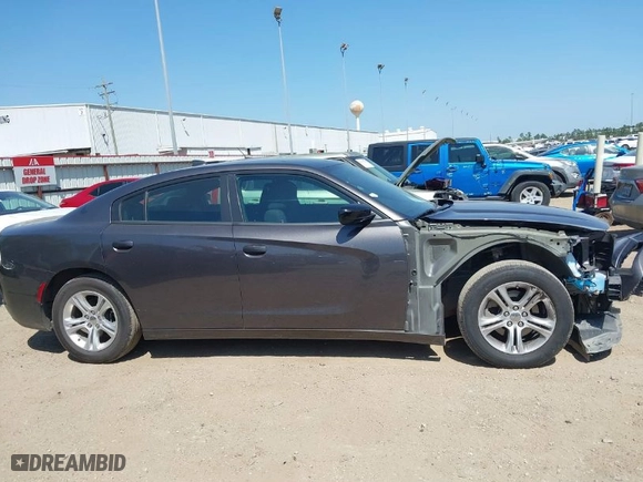 2023 Dodge Charger SXT with VIN 2C3CDXBG4PH515632, listed as a IAAI auction lot 42000682 with 56,163 mi miles. Bid and sale history available at carsss.com. Image 14.