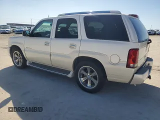 2003 Cadillac Escalade с VIN 1GYEC63T63R290034, выставлен на аукционе Copart как лот 46844735 с пробегом 304 433 миль миль и Чистый • Clean title. История ставок и продаж доступна на DreamBid. Изображение 2.