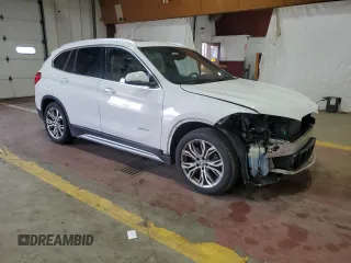 2017 BMW X1 xDrive28i with VIN WBXHT3Z34H4A54811, listed as a Copart auction lot 63584405 with 92,699 mi miles and Salvage title. Bid and sale history available at DreamBid. Image 4.