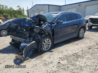 2016 Mazda CX-9 Sport с VIN JM3TCBBY3G0115468, выставлен на аукционе Copart как лот 57657865 с пробегом Не указан миль и Списание • Salvage title. История ставок и продаж доступна на DreamBid. Изображение 1.