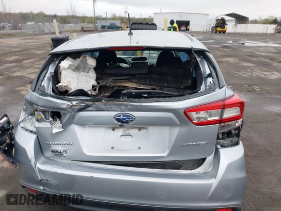 2019 Subaru Impreza with VIN 4S3GTAA65K3757170, listed as a IAAI auction lot 41976773 with 100,056 mi miles and . Bid and sale history available at DreamBid. Image 16.