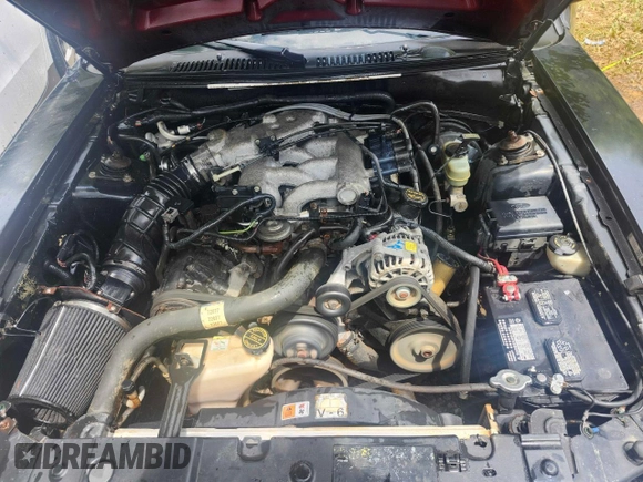 2002 Ford Mustang Standard with VIN 1FAFP40412F170034, listed as a Copart auction lot 61275825 with 174,868 mi miles and Salvage title. Bid and sale history available at DreamBid. Image 7.