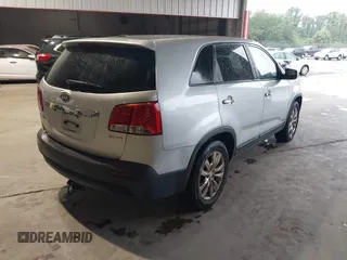 2011 Kia Sorento EX with VIN 5XYKUDA21BG024857, listed as a IAAI auction lot 42243340 with 145,514 mi miles and . Bid and sale history available at DreamBid. Image 4.