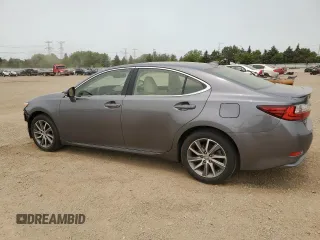 2016 Lexus ES 300h with VIN JTHBW1GG5G2103282, listed as a Copart auction lot 58801825 with 81,917 mi miles and Salvage title. Bid and sale history available at DreamBid. Image 2.