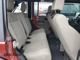2007 Jeep Wrangler Unlimited Sahara z VIN 1J4GB59157L199454, wystawiony jako Copart lot #82314724 z przebiegiem Nie podano mil oraz Czysty tytuł • Clean title. Historia ofert i sprzedaży dostępna na DreamBid. Obrazek 10.