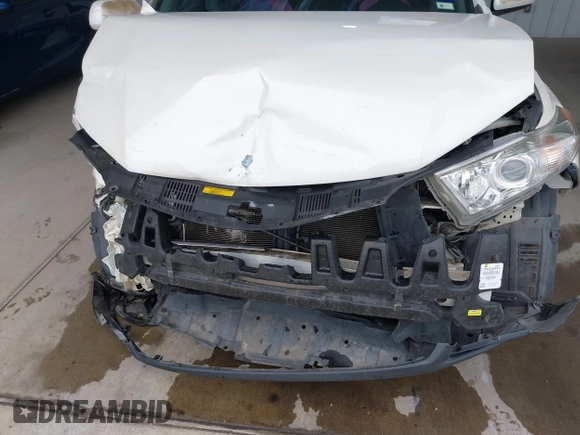 2013 Toyota Highlander with VIN 5TDZA3EH1DS037033, listed as a IAAI auction lot 39453343 with 163,149 mi miles and . Bid and sale history available at DreamBid. Image 14.