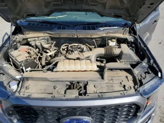 2023 Ford F-150 XL with VIN 1FTEW1CP4PKD21685, listed as a Copart auction lot 54992615 with 27,252 mi miles and Salvage title. Bid and sale history available at DreamBid. Image 11.