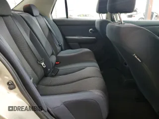 2009 Nissan Versa S z VIN 3N1BC11E69L406027, wystawiony jako Copart lot #50904135 z przebiegiem 163 718 mil mil oraz Szkoda całkowita • Salvage title. Historia ofert i sprzedaży dostępna na DreamBid. Obrazek 10.