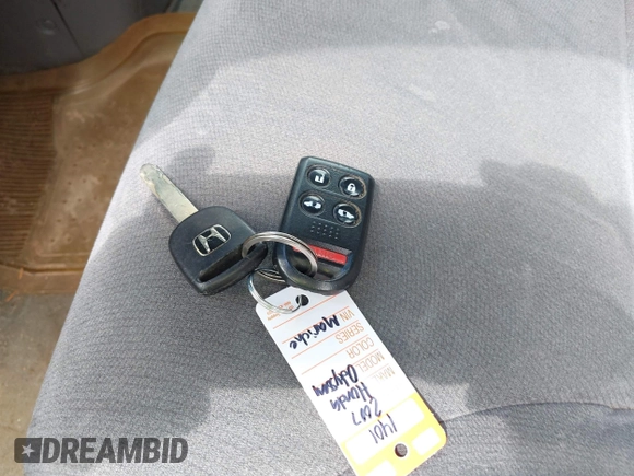 2007 Honda Odyssey EX with VIN 5FNRL38437B126937, listed as a IAAI auction lot 42098793 with 212,343 mi miles and . Bid and sale history available at DreamBid. Image 11.