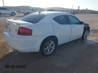 2014 Dodge Avenger SE with VIN 1C3CDZAB6EN180864, listed as a IAAI auction lot 41855043 with 99,977 mi miles. Bid and sale history available at carsss.com. Image 4.