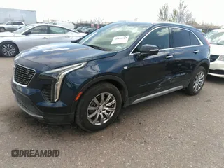 2021 Cadillac XT4 FWD Premium Luxury with VIN 1GYFZCR48MF004009, listed as a IAAI auction lot 41956723 with 82,483 mi miles. Bid and sale history available at carsss.com. Image 17.