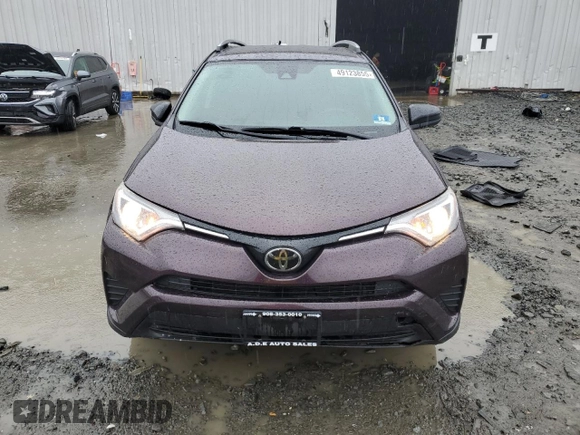 2018 Toyota RAV4 LE with VIN 2T3BFREV6JW737751, listed as a Copart auction lot 49123855 with 92,642 mi miles and Salvage Title. Bid and sale history available at DreamBid. Image 5.