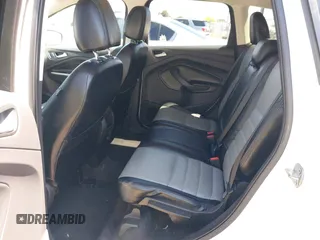 2015 Ford Escape SE with VIN 1FMCU0G91FUC65044, listed as a IAAI auction lot 42083688 with 111,972 mi miles and . Bid and sale history available at carsss.com. Image 8.
