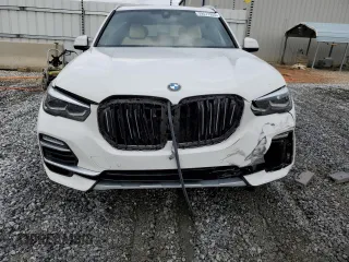 2021 BMW X5 sDrive40i with VIN 5UXCR4C04M9E30879, listed as a Copart auction lot 39577953 with 19,276 mi miles. Bid and sale history available at carsss.com. Image 5.