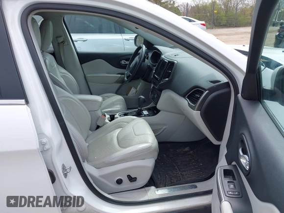 2019 Jeep Cherokee Limited with VIN 1C4PJLDB1KD387310, listed as a IAAI auction lot 42190270 with 96,635 mi miles and . Bid and sale history available at DreamBid. Image 5.