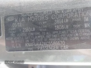 2012 Kia Forte EX with VIN KNAFU4A2XC5586670, listed as a IAAI auction lot 41233201 with 329,952 mi miles. Bid and sale history available at carsss.com. Image 8.