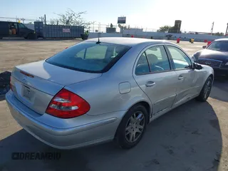 2005 Mercedes-Benz E-Class 3.2L with VIN WDBUF65JX5A718711, listed as a IAAI auction lot 41625603 with 145,024 mi miles. Bid and sale history available at carsss.com. Image 4.