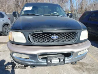 1998 Ford F-150 with VIN 1FTRX18L2WKA07312, listed as a IAAI auction lot 41327373 with 263,459 mi miles and . Bid and sale history available at DreamBid. Image 6.