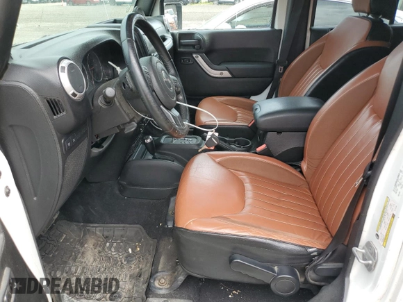 2014 Jeep Wrangler Unlimited Rubicon with VIN 1C4HJWFG4EL114743, listed as a Copart auction lot 61397575 with 110,222 mi miles and Salvage title. Bid and sale history available at DreamBid. Image 7.