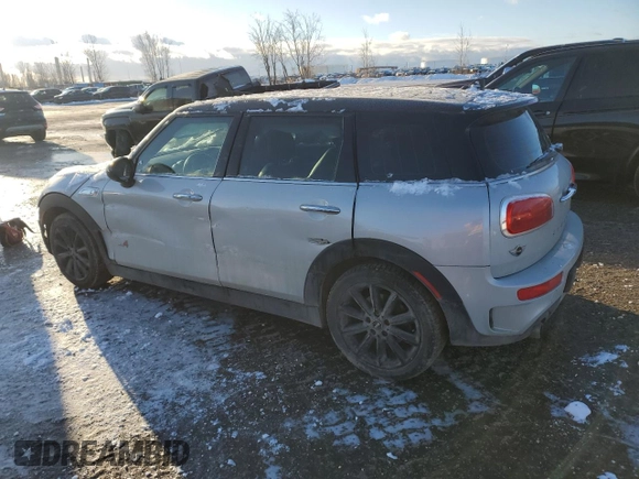 2017 MINI Clubman Cooper S with VIN WMWLU5C38H2E84018, listed as a Copart auction lot 83228824 with 151,963 mi miles and Salvage Title. Bid and sale history available at carsss.com. Image 2.