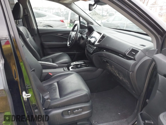 2017 Honda Pilot Touring with VIN 5FNYF6H90HB051700, listed as a IAAI auction lot 41902075 with 69,712 mi miles. Bid and sale history available at carsss.com. Image 5.