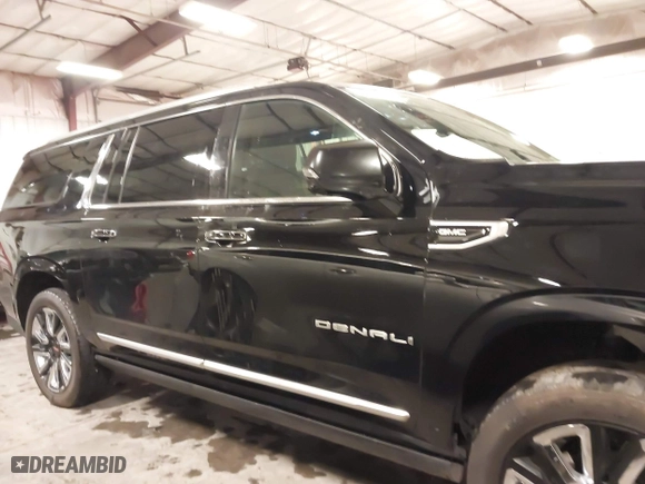 2021 GMC Yukon XL Denali with VIN 1GKS2JKL3MR149850, listed as a IAAI auction lot 41588274 with 77,181 mi miles. Bid and sale history available at carsss.com. Image 14.