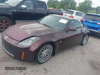 2003 Nissan 350Z Touring with VIN JN1AZ34E53T015620, listed as a IAAI auction lot 41877693 with 100,429 mi miles. Bid and sale history available at carsss.com. Image 2.