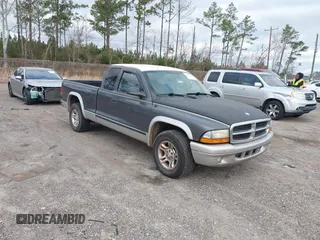 2003 Dodge Dakota SLT with VIN 1D7HL42N63S100130, listed as a IAAI auction lot 41419945 with 185,326 mi miles. Bid and sale history available at carsss.com. Image 1.
