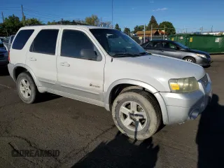 2006 Ford Escape Hybrid with VIN 1FMYU96H16KC06753, listed as a Copart auction lot 66938664 with 157,518 mi miles and Salvage Title. Bid and sale history available at carsss.com. Image 4.