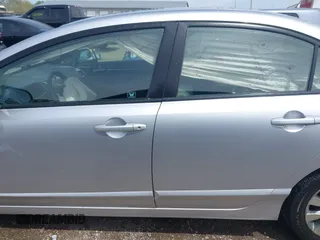 2009 Honda Civic EX-L z VIN 2HGFA16989H343295, wystawiony jako IAAI lot #42166246 z przebiegiem 147 871 mil mil oraz . Historia ofert i sprzedaży dostępna na DreamBid. Obrazek 13.