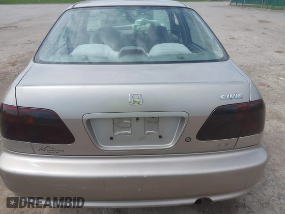 2000 Honda Civic LX with VIN 1HGEJ6670YL030749, listed as a IAAI auction lot 42112694 with 153,903 mi miles. Bid and sale history available at carsss.com. Image 16.
