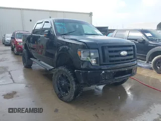 2010 Ford F-150 XL with VIN 1FTEW1CW2AFD86980, listed as a IAAI auction lot 42142860 with 218,615 mi miles. Bid and sale history available at carsss.com. Image 1.