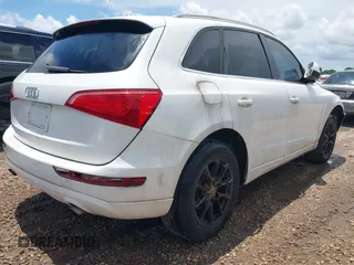 2011 Audi Q5 with VIN WA1CFBFP1BA005856, listed as a IAAI auction lot 42530858 with 162,384 mi miles and . Bid and sale history available at DreamBid. Image 4.