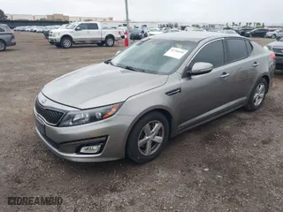 2015 Kia Optima LX with VIN 5XXGM4A74FG402150, listed as a IAAI auction lot 41756410 with 75,214 mi miles. Bid and sale history available at carsss.com. Image 2.