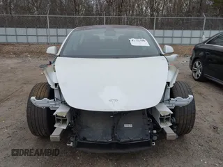 2020 Tesla Model 3 Standard Range Plus with VIN 5YJ3E1EA1LF799766, listed as a IAAI auction lot 41386508 with 90,000 mi miles. Bid and sale history available at carsss.com. Image 13.