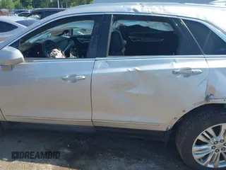 2019 Cadillac XT5 Premium Luxury AWD with VIN 1GYKNFRS7KZ145045, listed as a IAAI auction lot 39607961 with Not provided miles and . Bid and sale history available at DreamBid. Image 13.