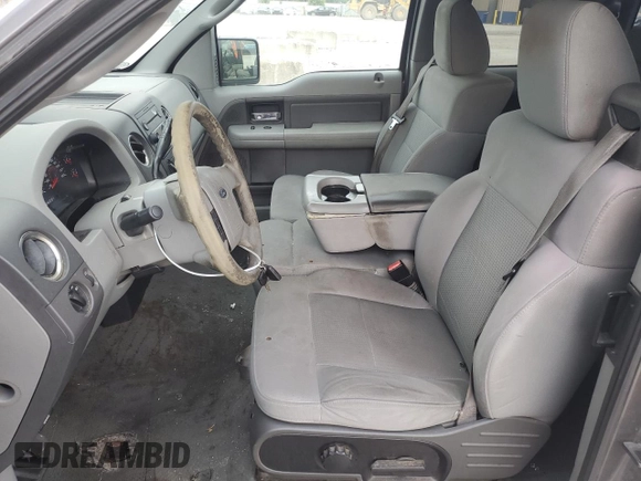 2007 Ford F-150 STX с VIN 1FTRX12W67KD44571, выставлен на аукционе Copart как лот 59526705 с пробегом 122 368 миль миль и Списание • Salvage title. История ставок и продаж доступна на DreamBid. Изображение 7.