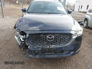 2023 Mazda CX-5 Signature with VIN JM3KFBXY5P0251046, listed as a IAAI auction lot 41505815 with 37,594 mi miles and . Bid and sale history available at carsss.com. Image 6.