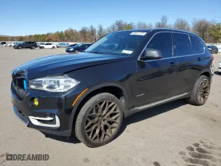2016 BMW X5 xDrive35i with VIN 5UXKR0C5XG0P27449, listed as a Copart auction lot 50991725 with 141,649 mi miles and Salvage Title. Bid and sale history available at carsss.com. Image 1.