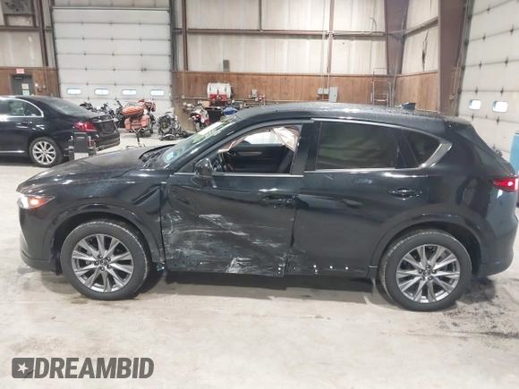 2024 Mazda CX-5 2.5 S Premium Package with VIN JM3KFBDMXR0351289, listed as a IAAI auction lot 41657792 with 22,260 mi miles. Bid and sale history available at carsss.com. Image 14.