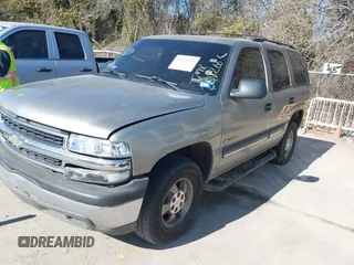 2001 Chevrolet Tahoe LS z VIN 1GNEC13T61R208266, wystawiony jako IAAI lot #41370967 z przebiegiem 378 105 mil mil oraz . Historia ofert i sprzedaży dostępna na DreamBid. Obrazek 2.