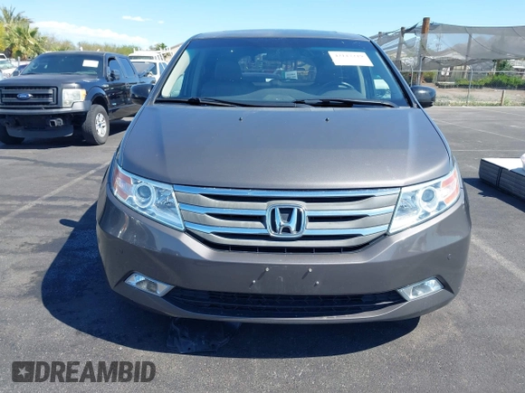 2013 Honda Odyssey Touring with VIN 5FNRL5H95DB045666, listed as a IAAI auction lot 42117219 with 50,715 mi miles and . Bid and sale history available at carsss.com. Image 12.