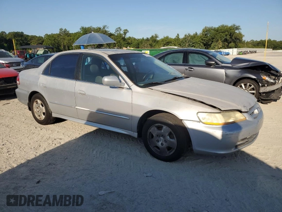 2001 Honda Accord EX z VIN 1HGCG16531A063589, wystawiony jako Copart lot #57875015 z przebiegiem Nie podano mil oraz Szkoda całkowita • Salvage title. Historia ofert i sprzedaży dostępna na DreamBid. Obrazek 4.