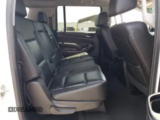 2019 Chevrolet Suburban LT with VIN 1GNSCHKCXKR207233, listed as a Copart auction lot 55410464 with 107,500 mi miles and Salvage Title. Bid and sale history available at DreamBid. Image 12.