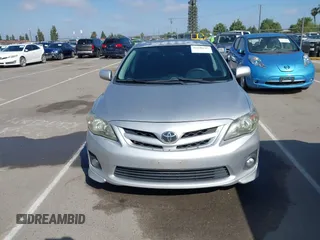 2012 Toyota Corolla L with VIN 2T1BU4EEXCC866050, listed as a IAAI auction lot 42140147 with 212,814 mi miles. Bid and sale history available at carsss.com. Image 12.
