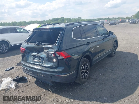 2018 Volkswagen Tiguan SEL z VIN 3VV2B7AX0JM047200, wystawiony jako IAAI lot #42221523 z przebiegiem 108 753 mil mil oraz . Historia ofert i sprzedaży dostępna na DreamBid. Obrazek 4.