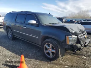 2014 Chevrolet Suburban LTZ with VIN 1GNSCKE08ER230741, listed as a Copart auction lot 47234095 with 184,263 mi miles and Salvage title. Bid and sale history available at DreamBid. Image 4.