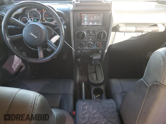 2009 Jeep Wrangler Rubicon with VIN 1J8GA64159L700909, listed as a Copart auction lot 86308954 with 138,065 mi miles and Salvage title. Bid and sale history available at DreamBid. Image 8.
