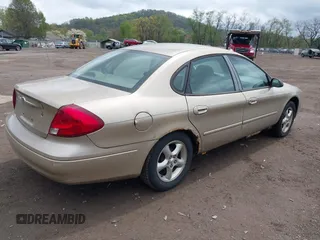 2000 Ford Taurus SE with VIN 1FAFP53UXYA128419, listed as a IAAI auction lot 42052508 with 90,219 mi miles and . Bid and sale history available at carsss.com. Image 4.
