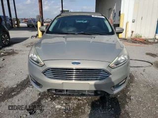 2016 Ford Focus Titanium with VIN 1FADP3N24GL302625, listed as a Copart auction lot 59180675 with 97,401 mi miles and Salvage title. Bid and sale history available at DreamBid. Image 5.